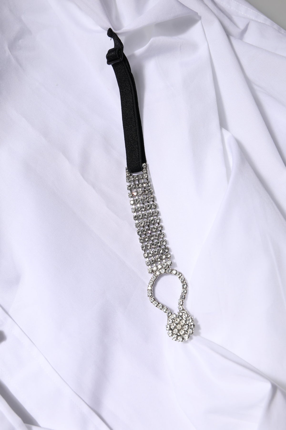 Elevate your wardrobe with the Dolce & Gabbana White Rhinestone Embellish Long Sleeves Top, a masterpiece of Italian craftsmanship in luxurious cotton, perfect for those who embody elegance and confidence.