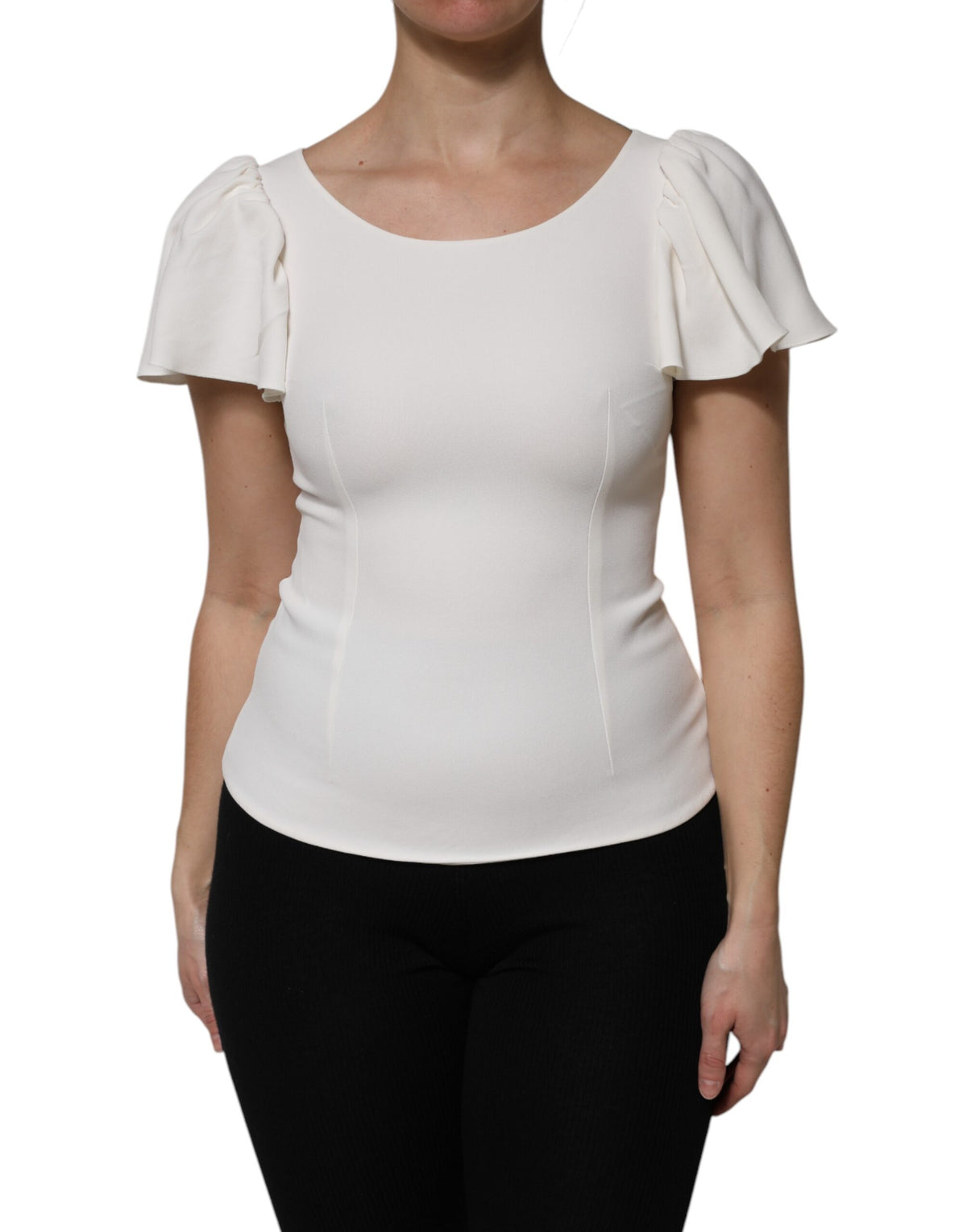 Elevate your wardrobe with the Dolce & Gabbana White Viscose Round Neck Top, a masterpiece of Italian craftsmanship that embodies timeless elegance and versatile luxury.