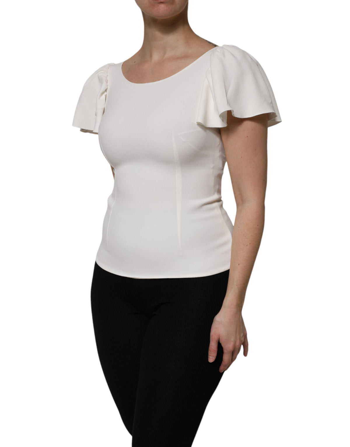 Indulge in the exquisite allure of Dolce & Gabbana's White Viscose Round Neck Top, a timeless piece crafted in Italy, embodying luxury and refined elegance for every occasion.