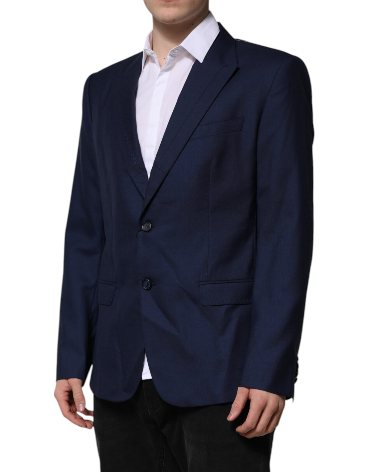 Experience the allure of the Dolce & Gabbana Blue Wool Suit Coat Blazer, a masterpiece of luxury tailoring crafted from exquisite materials, elevating your style with timeless sophistication.