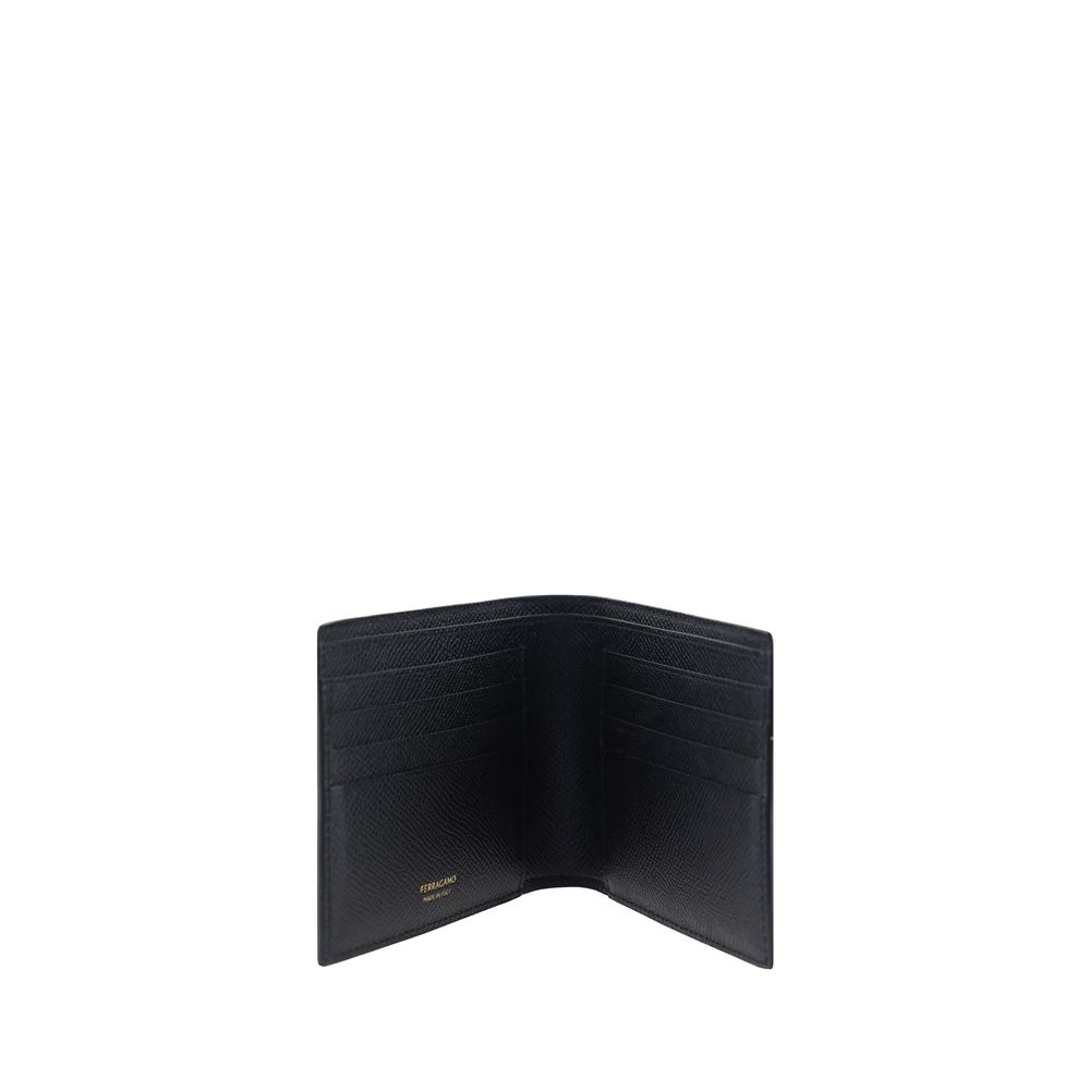 Elevate your style with the Ferragamo Black Calf Leather Bos Taurus Wallet, a masterpiece of craftsmanship and timeless elegance, perfect for discerning individuals.