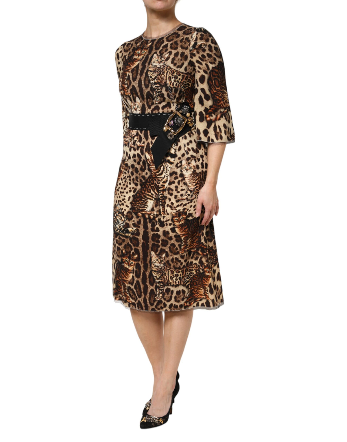 Experience the allure of the Dolce & Gabbana Brown Leopard Print Belted A-line Midi Dress, a luxurious blend of virgin wool and nylon, embodying Italian craftsmanship and timeless elegance.