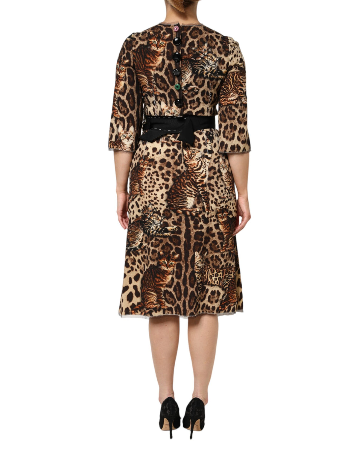 Elevate your elegance with the Dolce & Gabbana Brown Leopard Print Belted A-line Midi Dress, crafted from luxurious virgin wool and nylon, embodying Italian artistry and timeless allure.