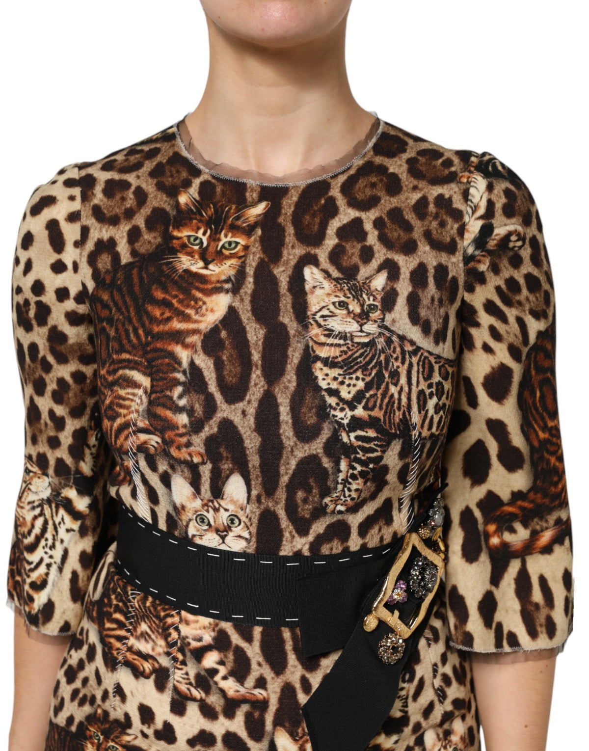 Indulge in the exquisite Dolce & Gabbana Brown Leopard Print Belted A-line Midi Dress, crafted from luxurious virgin wool and nylon, embodying timeless elegance and artisanal mastery.