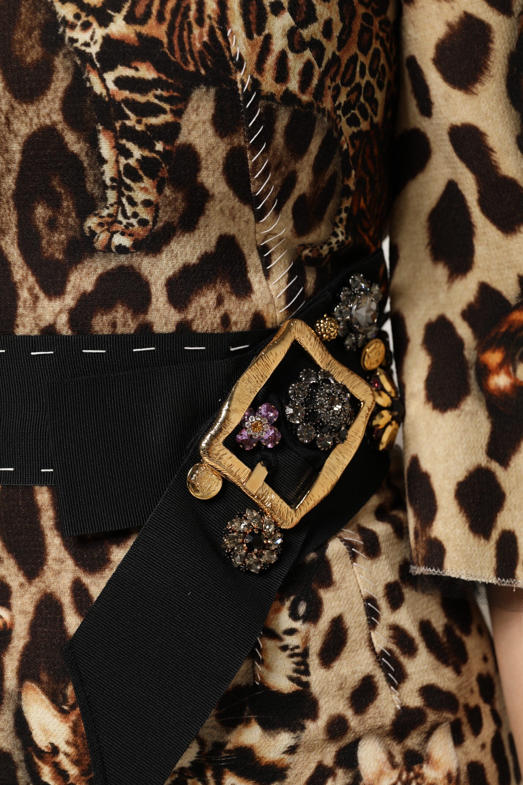 Indulge in the exquisite Dolce & Gabbana Brown Leopard Print Belted A-line Midi Dress, crafted from luxurious virgin wool and nylon, embodying timeless elegance and artisanal craftsmanship.