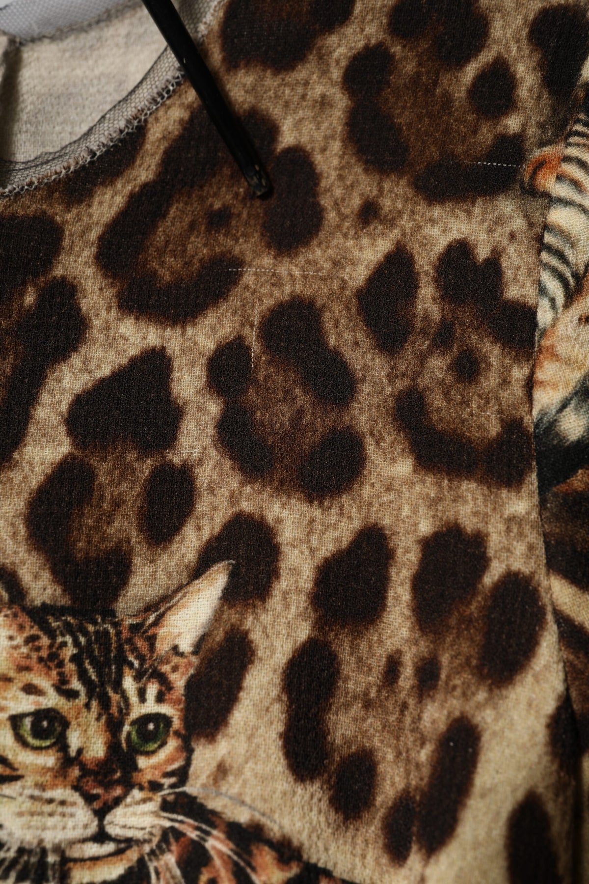 Indulge in the exquisite Dolce & Gabbana Brown Leopard Print Belted A-line Midi Dress, crafted from luxurious virgin wool for a timelessly elegant silhouette that captivates.