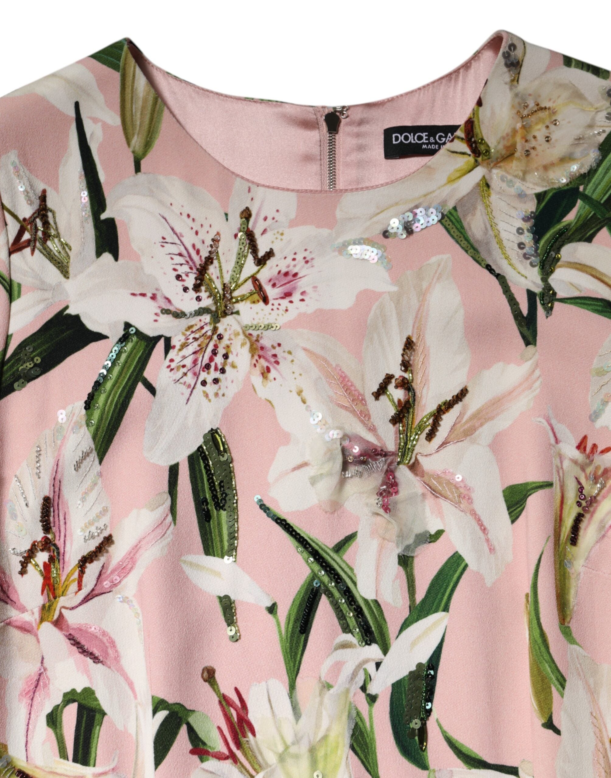 Indulge in the allure of the Dolce & Gabbana Pink Lily Viscose Sheath Midi Dress, a masterpiece of Italian craftsmanship that embodies elegance and sophistication for every occasion.