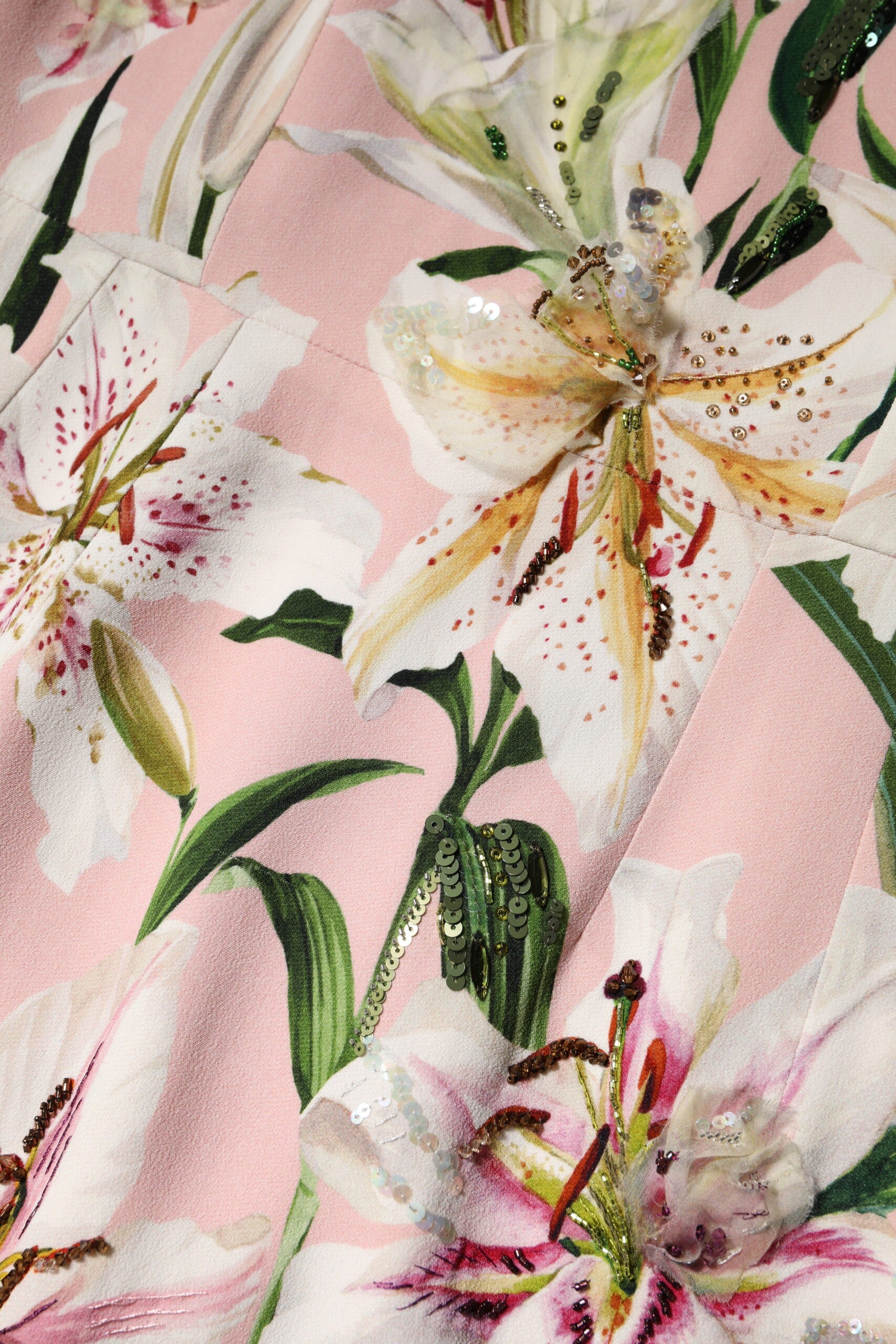 Indulge in the exquisite allure of the Dolce & Gabbana Pink Lily Viscose Sheath Midi Dress, a masterpiece of Italian craftsmanship that embodies luxury and sophistication.