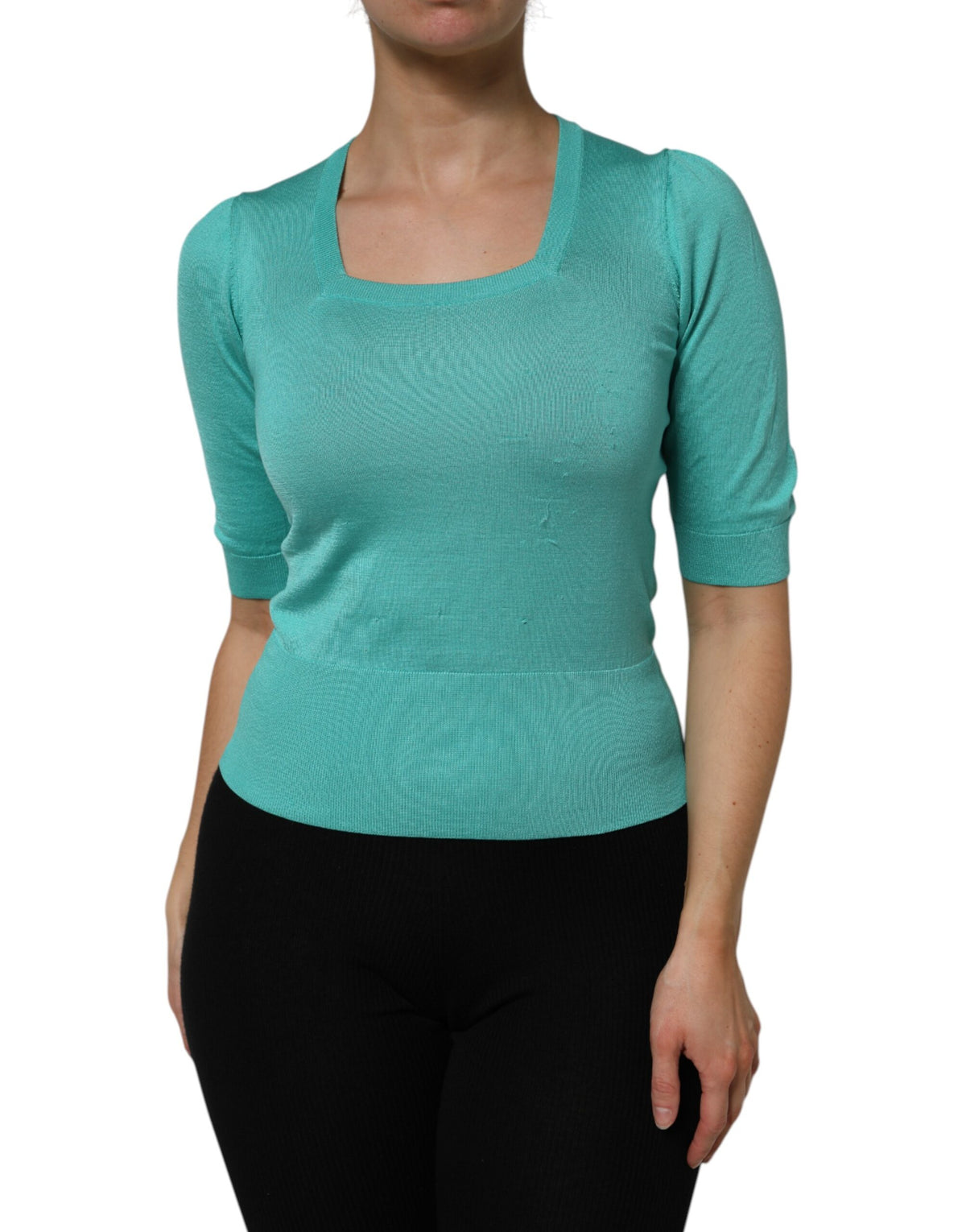 Indulge in the exquisite craftsmanship of Dolce & Gabbana's Aqua Blue Silk Short Sleeves Square Neck Top, a timeless piece that embodies luxury and allure, perfect for any elegant occasion.