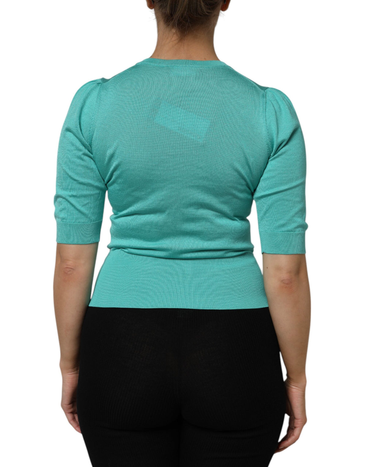 Indulge in the exquisite allure of Dolce & Gabbana's Aqua Blue Silk Short Sleeves Square Neck Top, a timeless piece that embodies luxury and sophistication.