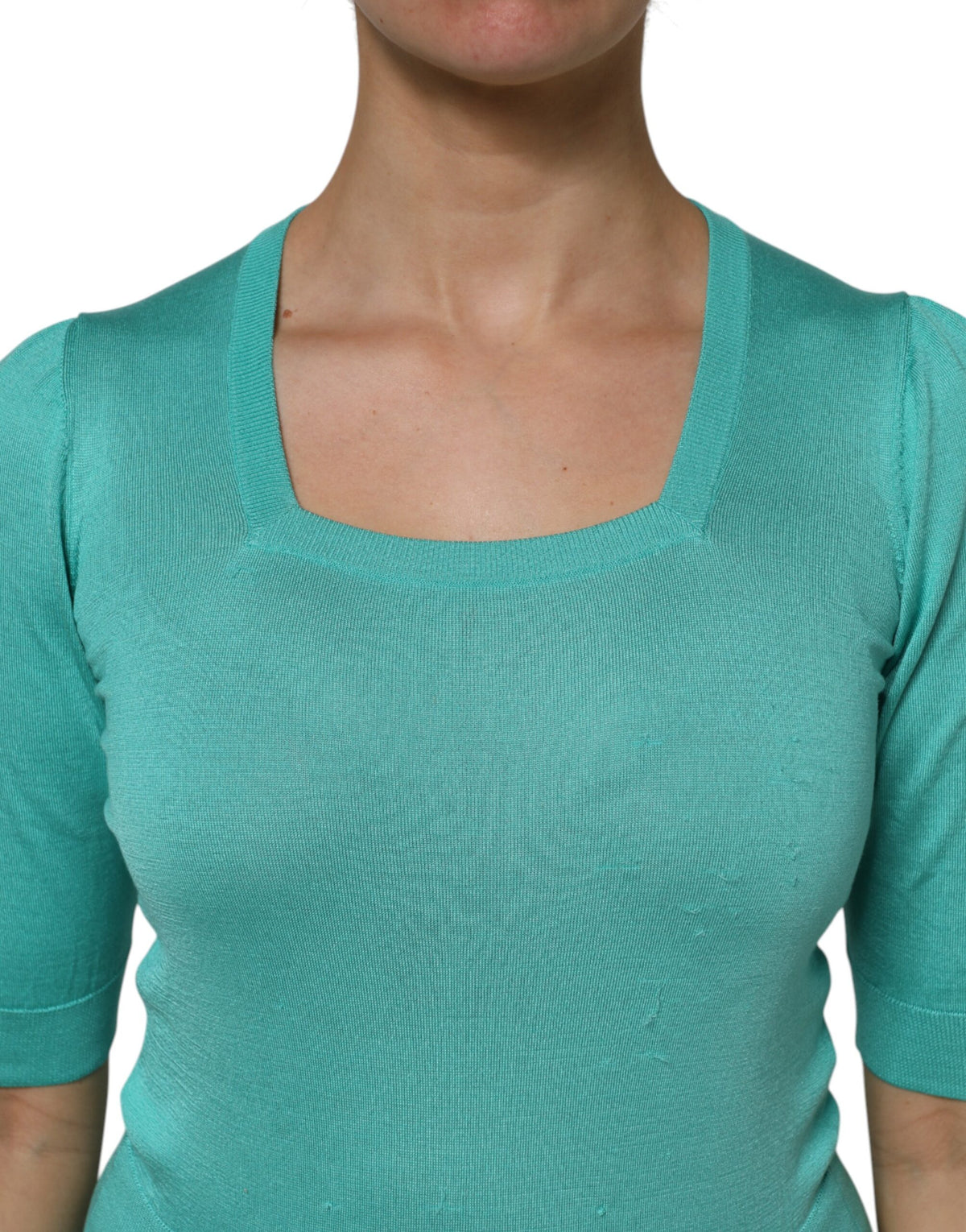 Indulge in the exquisite allure of the Dolce & Gabbana Aqua Blue Silk Short Sleeves Square Neck Top, a timeless piece that embodies luxury and sophistication, perfect for any elegant occasion.