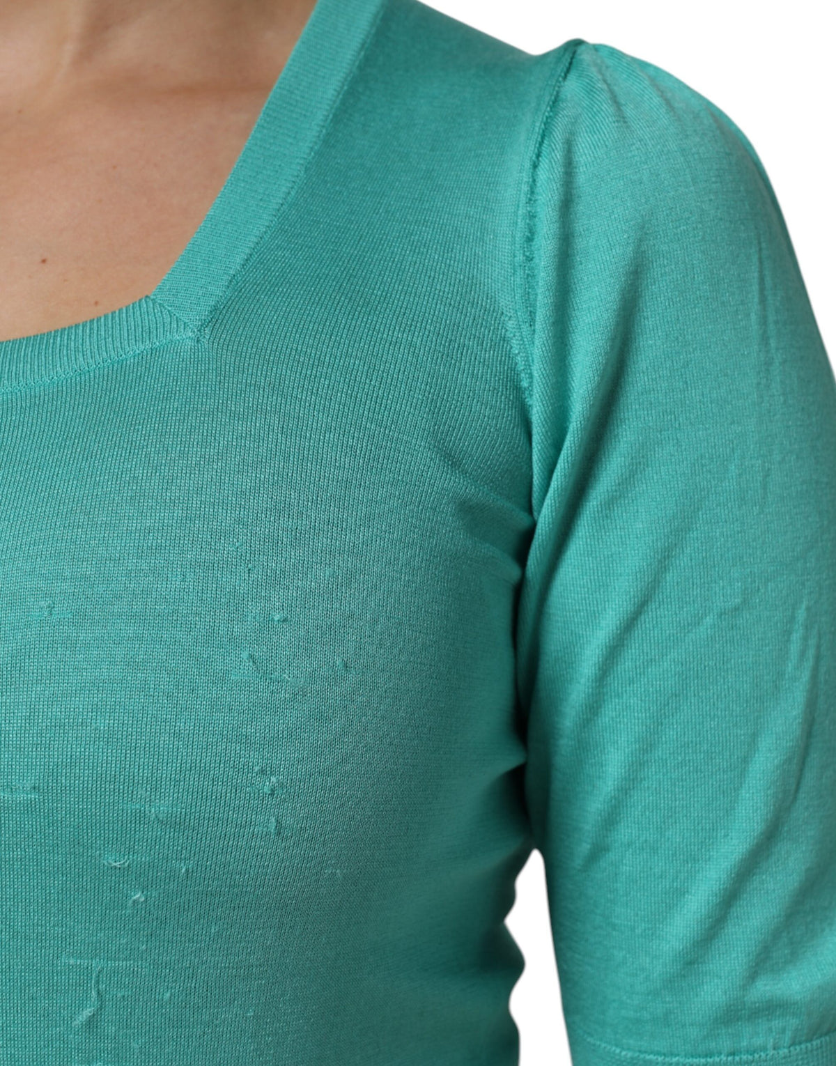 Indulge in the exquisite Aqua Blue Silk Short Sleeves Square Neck Top by Dolce & Gabbana, a timeless piece that embodies luxury and sophistication, perfect for any elegant occasion.