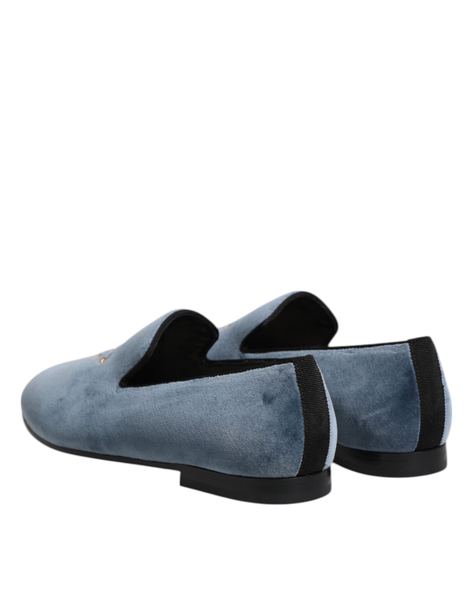 Indulge in the exquisite Dolce & Gabbana Blue Velvet DG Logo Loafers, where premium velvet leather meets Italian craftsmanship for unparalleled elegance and allure.