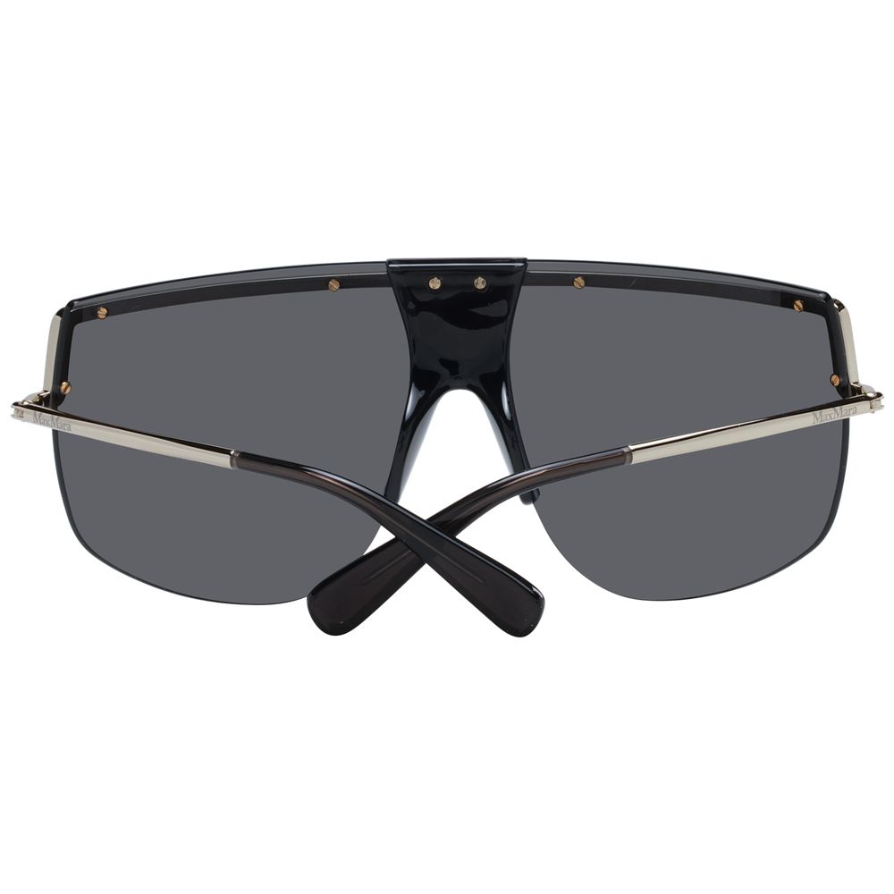 Elevate your style with Max Mara Gold Metal Sunglasses, a luxurious blend of exquisite craftsmanship and timeless elegance, offering 100% UV protection for discerning tastes.