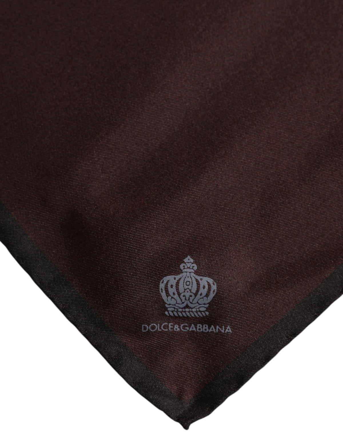 Elevate your style with the Dolce & Gabbana Brown DG Crown Silk Square Men Foulard Scarf, a masterpiece of Italian craftsmanship that embodies timeless luxury and sophistication.