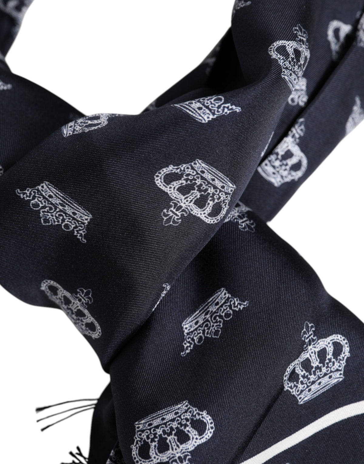 Elevate your elegance with the Dolce & Gabbana Black Silk Crown Fringes Foulard Scarf, a luxurious 100% silk accessory that embodies sophistication and timeless allure.