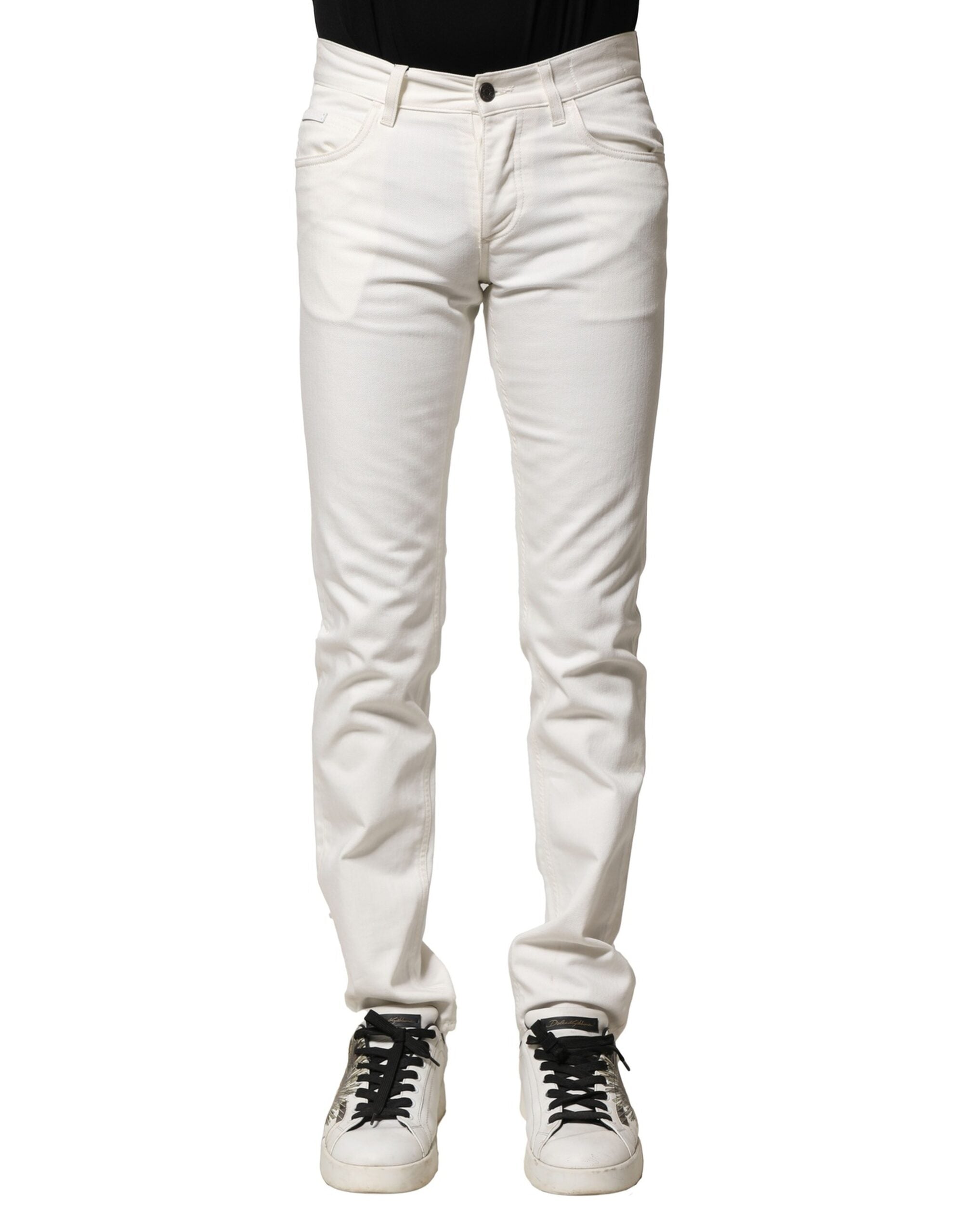Experience the exquisite Dolce & Gabbana White Cotton Skinny Men Denim Jeans, where artisan craftsmanship meets timeless luxury, perfect for the discerning individual.