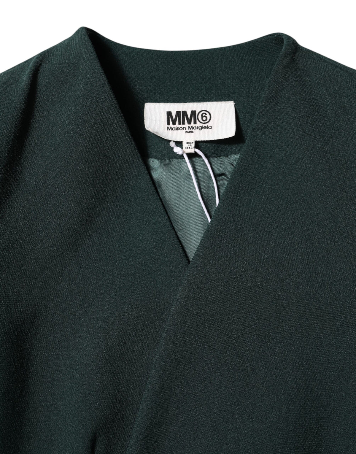 Elevate your wardrobe with the Maison Margiela Green Single Breasted One Button Coat, a timeless piece of Italian craftsmanship in luxurious polyester and viscose, perfect for any sophisticated occasion.