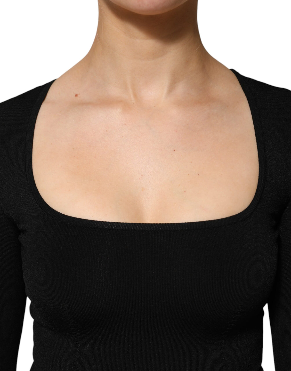 Indulge in the Dolce & Gabbana Black Square Neck Long Sleeves Pullover Top, a masterpiece of Italian craftsmanship, blending luxury and elegance for the discerning individual.