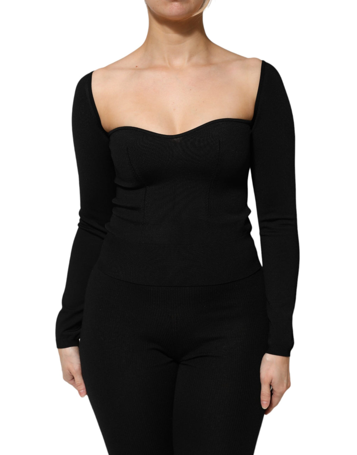 Indulge in the exquisite allure of Dolce & Gabbana's Black Viscose Long Sleeve Pullover Blouse, a timeless piece that embodies luxurious craftsmanship and sophisticated elegance.