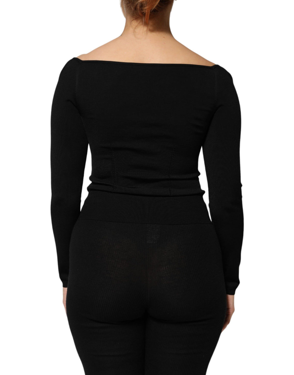 Indulge in the exquisite allure of the Dolce & Gabbana Black Viscose Long Sleeve Pullover Blouse, a timeless piece that embodies luxurious craftsmanship and effortless elegance.