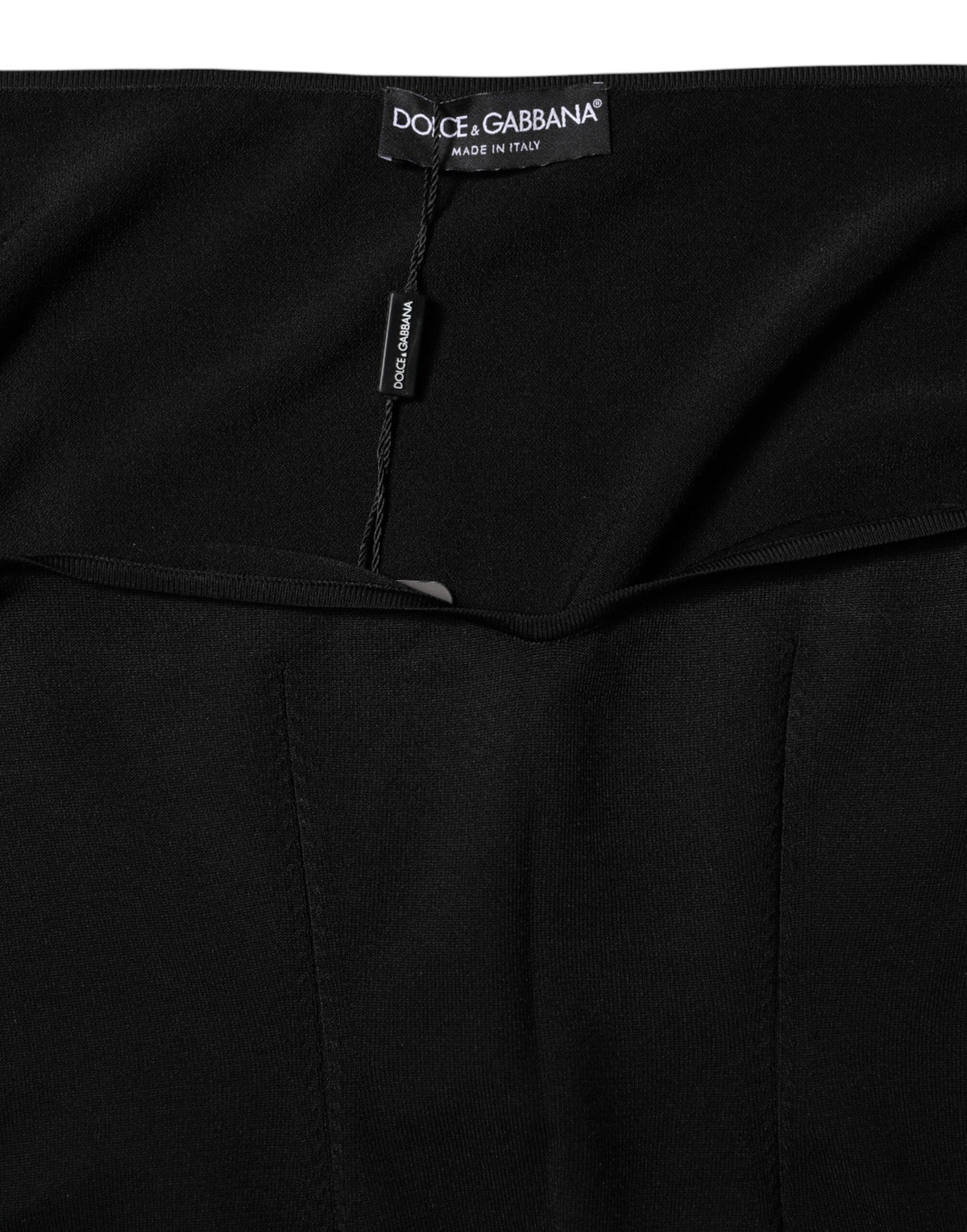 Indulge in the exquisite elegance of the Dolce & Gabbana Black Viscose Long Sleeve Pullover Blouse, a timeless piece that embodies luxury and sophistication.