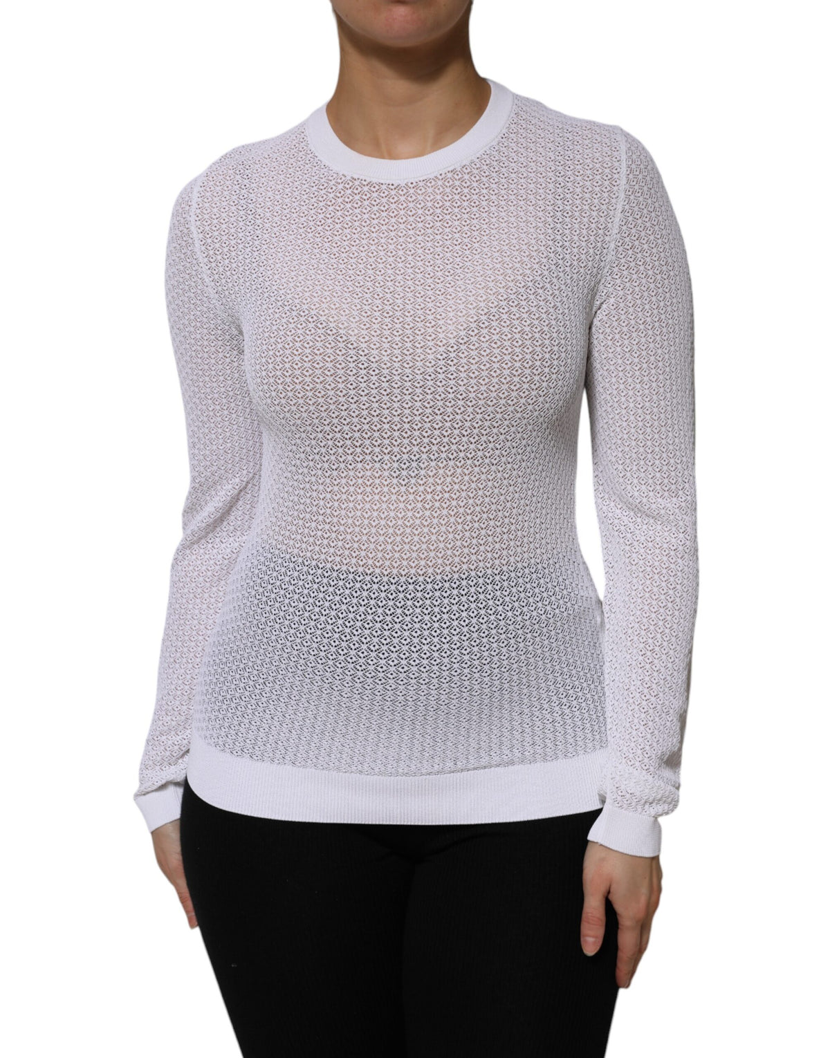 Discover the Dolce & Gabbana White Round Neck Long Sleeves Pullover Top, an exquisite blend of luxury and sophistication, crafted in Italy for timeless elegance.