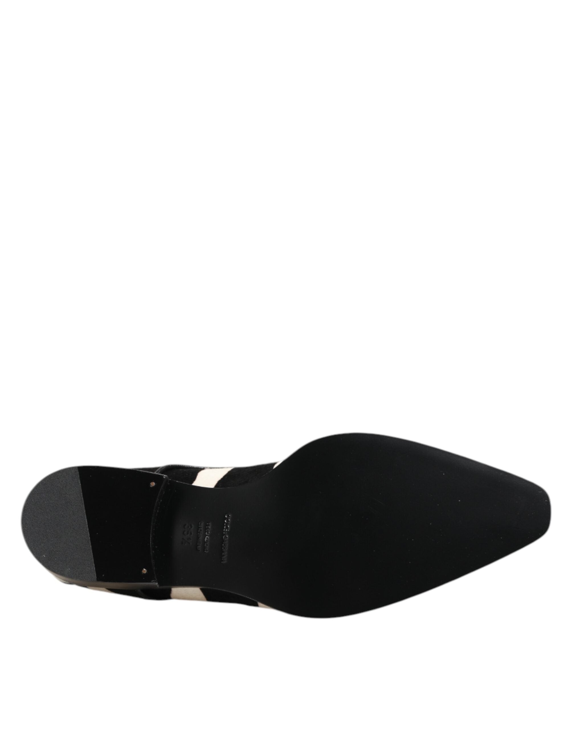 Elevate your style with Dolce & Gabbana's Black White Zebra Pony Fur Dress Shoes, where luxurious calf fur meets exquisite craftsmanship for an unforgettable statement.