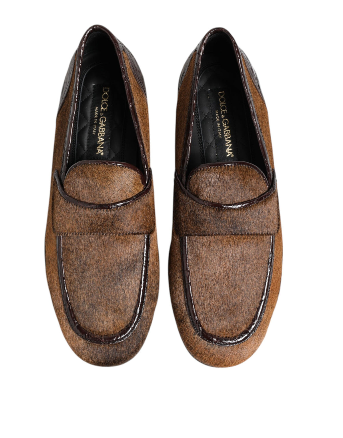 Experience the exquisite Dolce & Gabbana Brown Loafers, crafted from caiman and calf fur leather, embodying timeless elegance and unparalleled Italian craftsmanship.