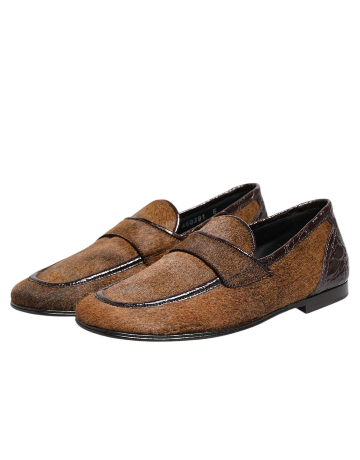 Discover the exquisite Dolce & Gabbana Brown Loafers, crafted from caiman and calf fur leather, embodying timeless elegance and luxurious Italian craftsmanship for the discerning individual.