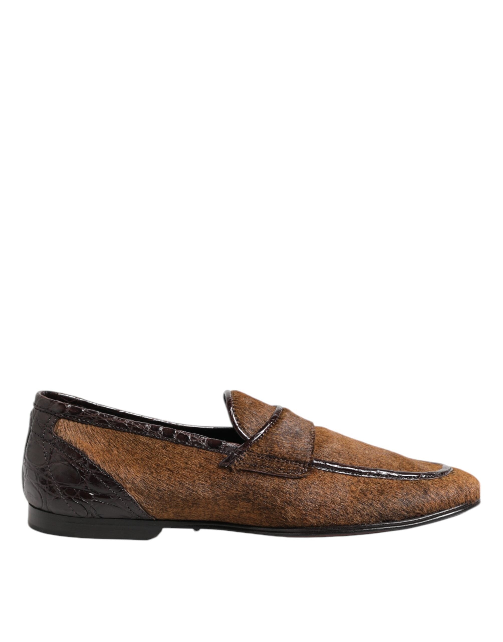 Experience the allure of Dolce & Gabbana Brown Loafers, crafted from caiman and calf fur leather, epitomizing sophistication and timeless elegance for the discerning individual.