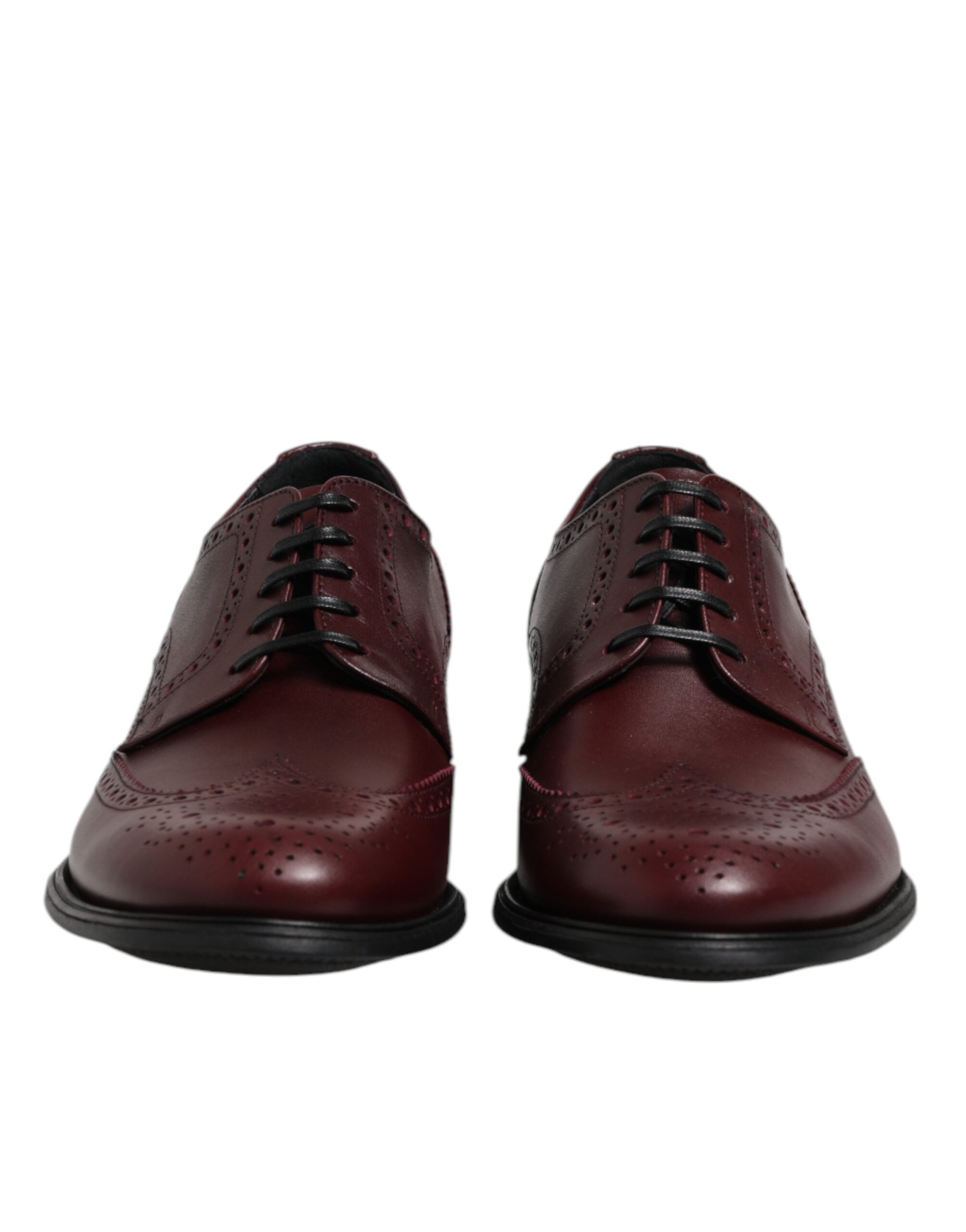 Step into a realm of elegance with Dolce & Gabbana's Brown Leather Lace Up Derby Dress Shoes, where exquisite Italian craftsmanship meets timeless sophistication for the discerning individual.