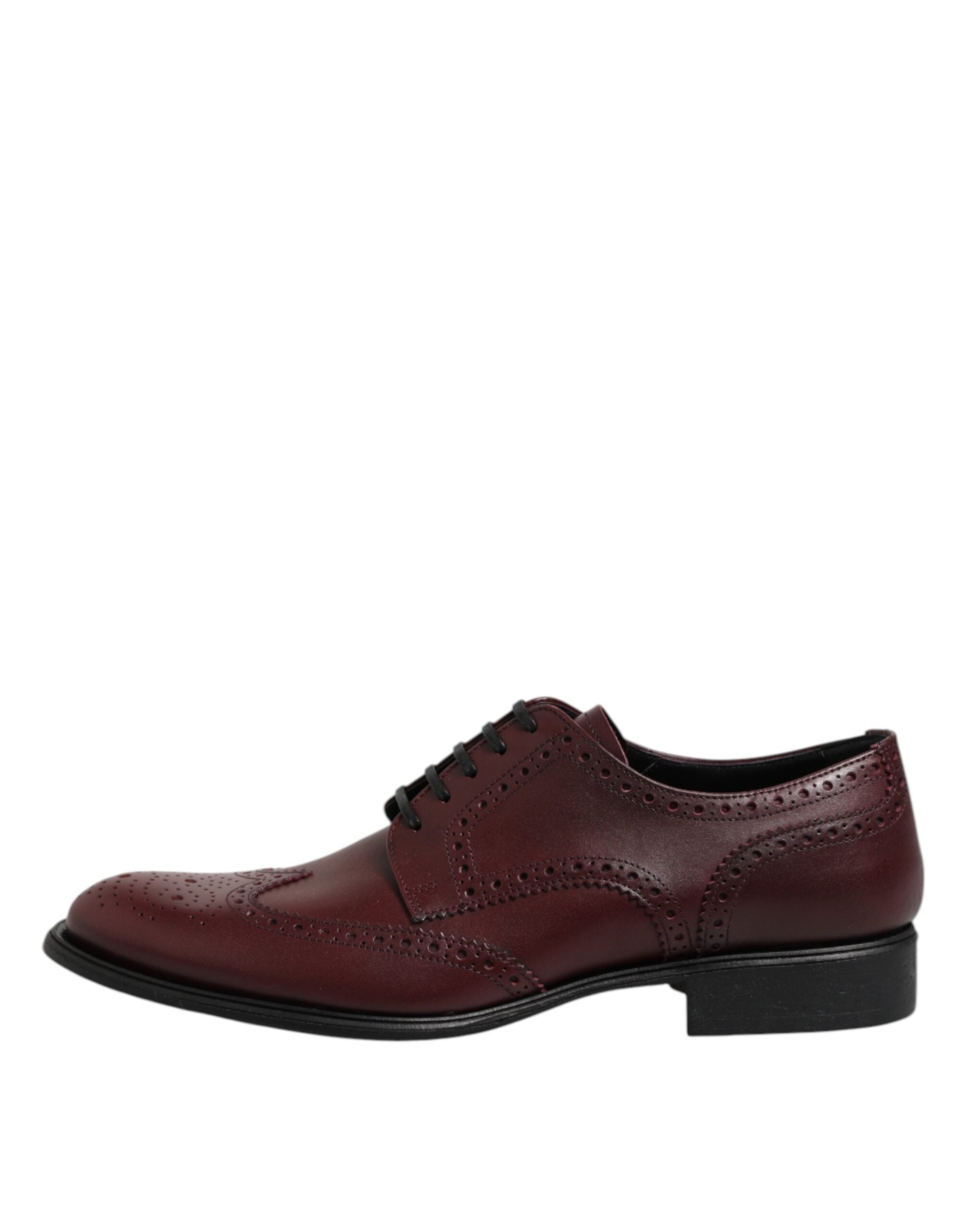 Experience the exquisite Dolce & Gabbana Brown Leather Lace Up Derby Dress Shoes, crafted in Italy from 100% leather, where timeless elegance meets unparalleled sophistication.