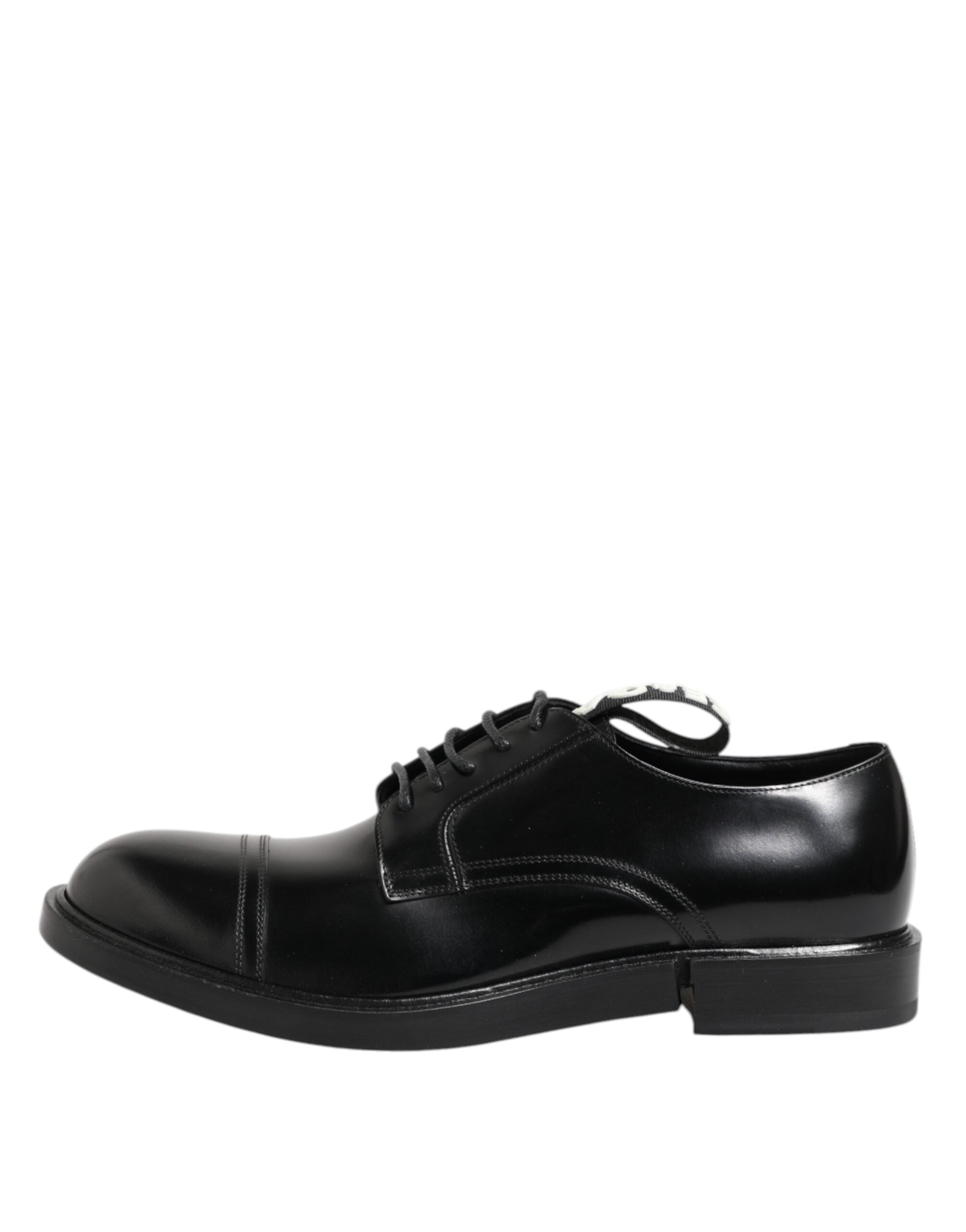 Experience the exquisite craftsmanship of Dolce & Gabbana's Black Leather Dress Lace Up Shoes, where timeless luxury meets modern elegance, perfect for the discerning individual.