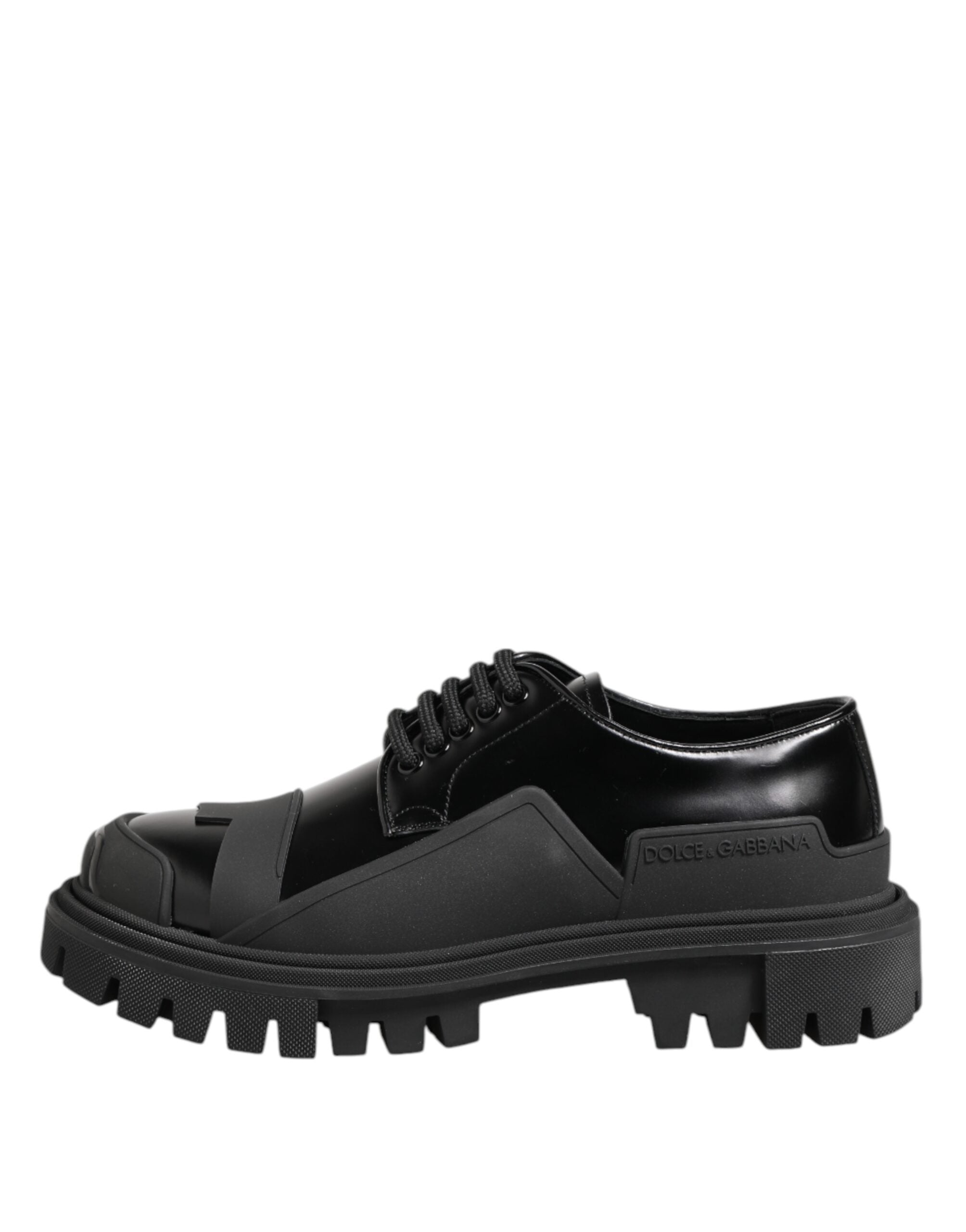 Step into a realm of sophistication with Dolce & Gabbana Black Patent Leather Derby Shoes, crafted from premium calf leather for timeless elegance and unparalleled allure.