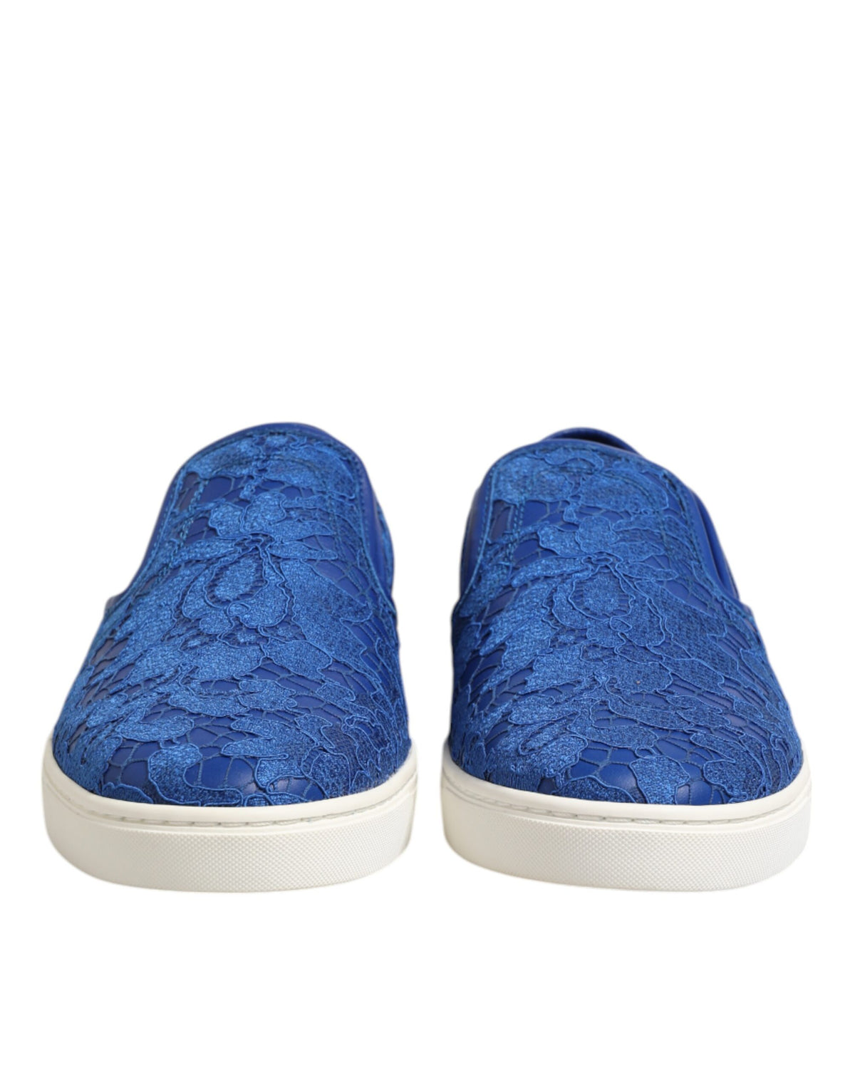 Discover the exquisite Dolce & Gabbana Blue Leather Lace Slip On Sneakers, where luxurious materials and masterful Italian craftsmanship elevate your style to new heights of elegance.