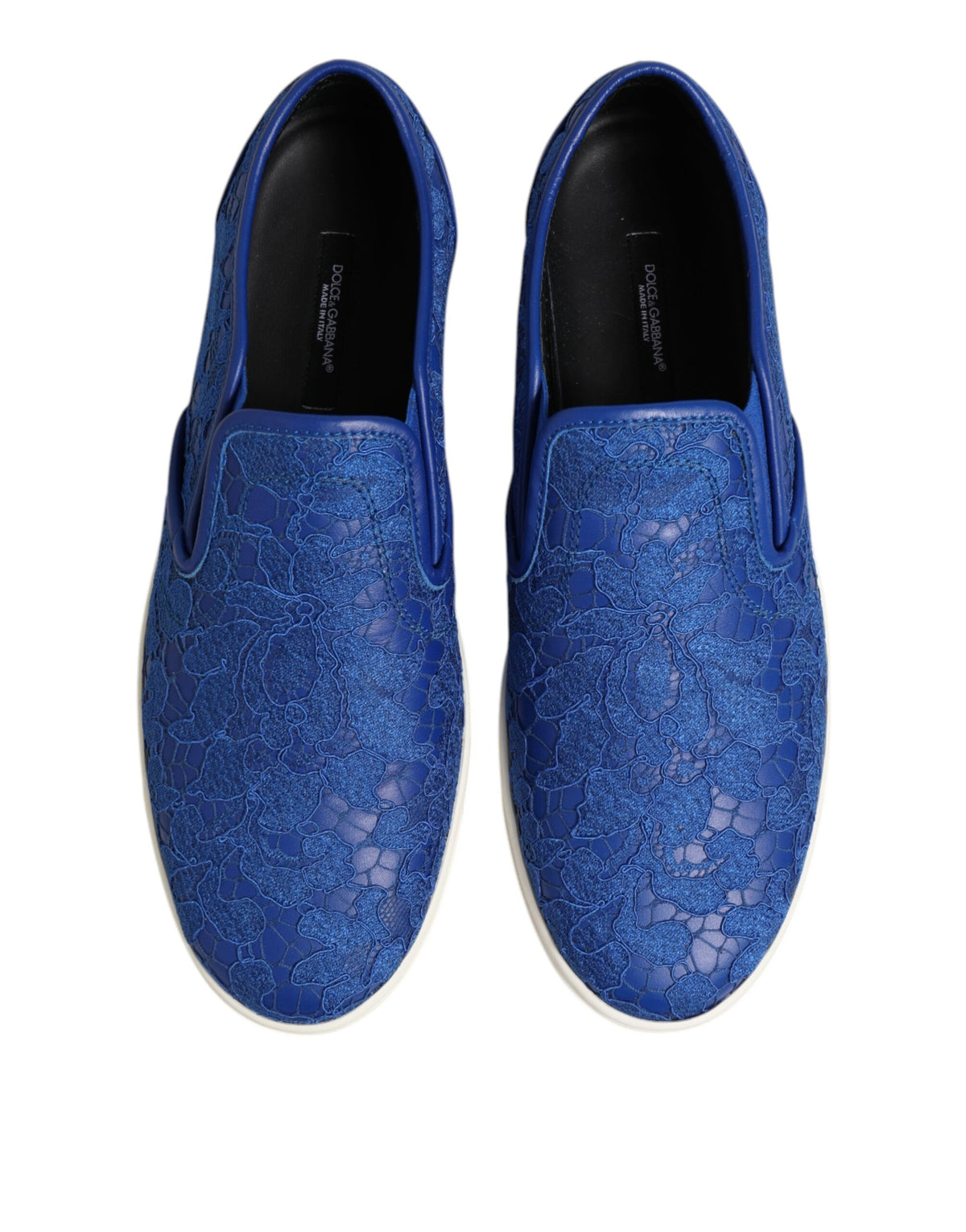Indulge in the exquisite craftsmanship of Dolce & Gabbana's Blue Leather Lace Slip On Sneakers, where luxurious materials meet timeless elegance for the discerning individual.