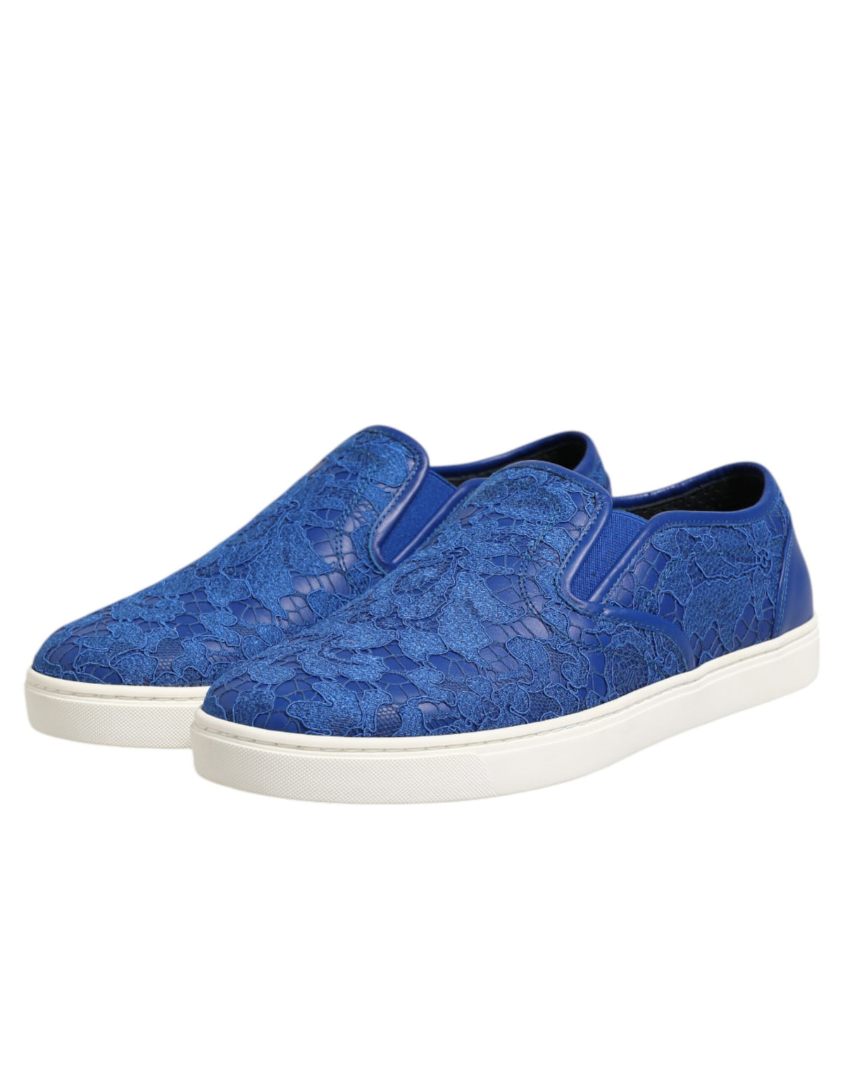 Indulge in the exquisite craftsmanship of Dolce & Gabbana's Blue Leather Lace Slip On Sneakers, where luxurious materials meet timeless elegance for the discerning individual.