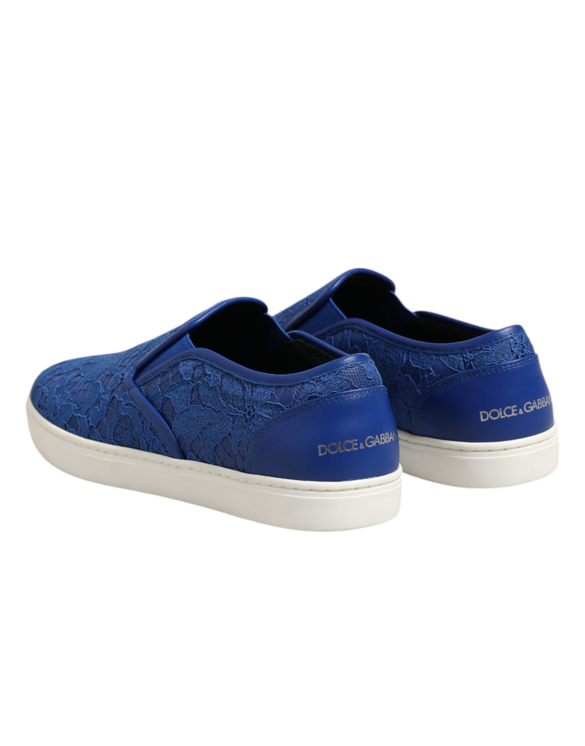 Indulge in the exquisite craftsmanship of Dolce & Gabbana's Blue Leather Lace Slip On Sneakers, where luxurious materials meet timeless elegance for the discerning individual.