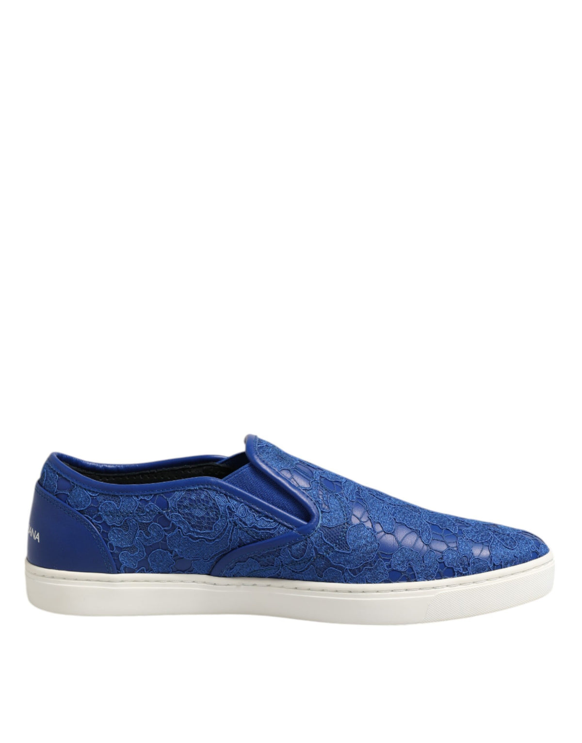 Indulge in the exquisite luxury of Dolce & Gabbana's Blue Leather Lace Slip On Sneakers, where masterful Italian craftsmanship meets timeless elegance for the discerning individual.