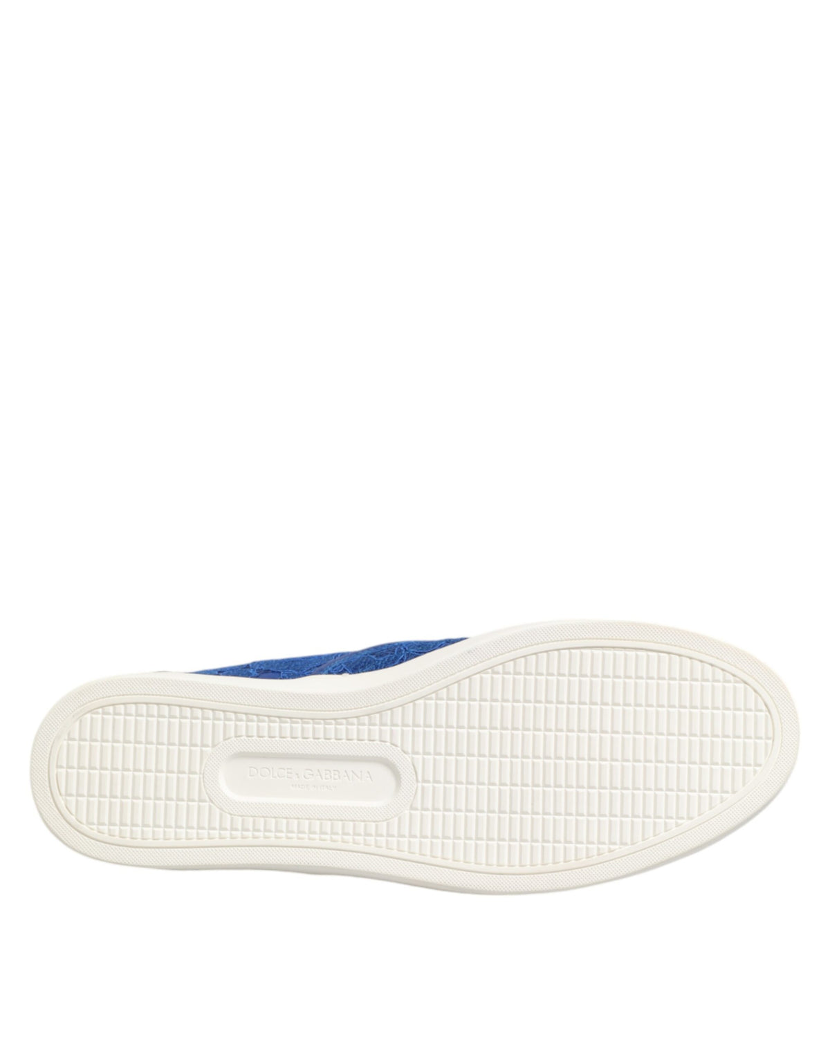 Indulge in the exquisite luxury of Dolce & Gabbana Blue Leather Lace Slip On Sneakers, where masterful Italian craftsmanship meets timeless elegance for the discerning individual.