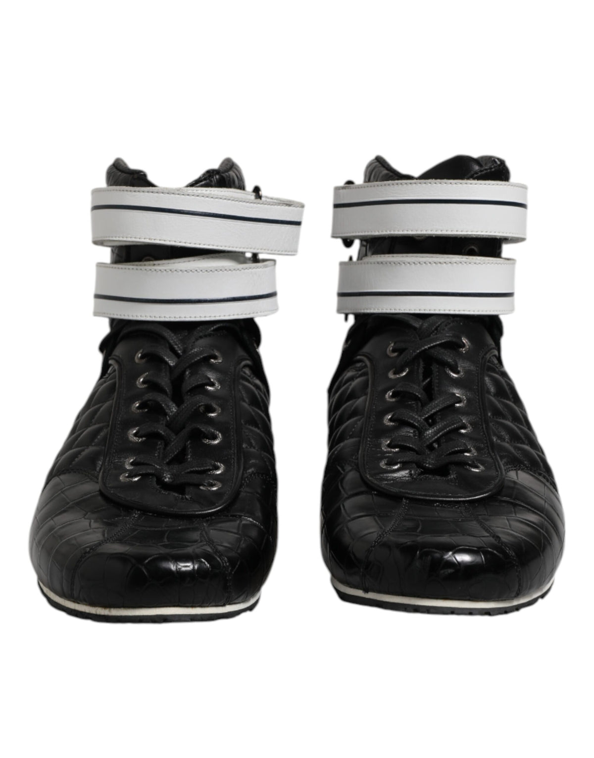 Elevate your style with Dolce & Gabbana's Black Quilted Leather Lace Up Sneakers, where exquisite craftsmanship meets luxurious comfort for the discerning individual.