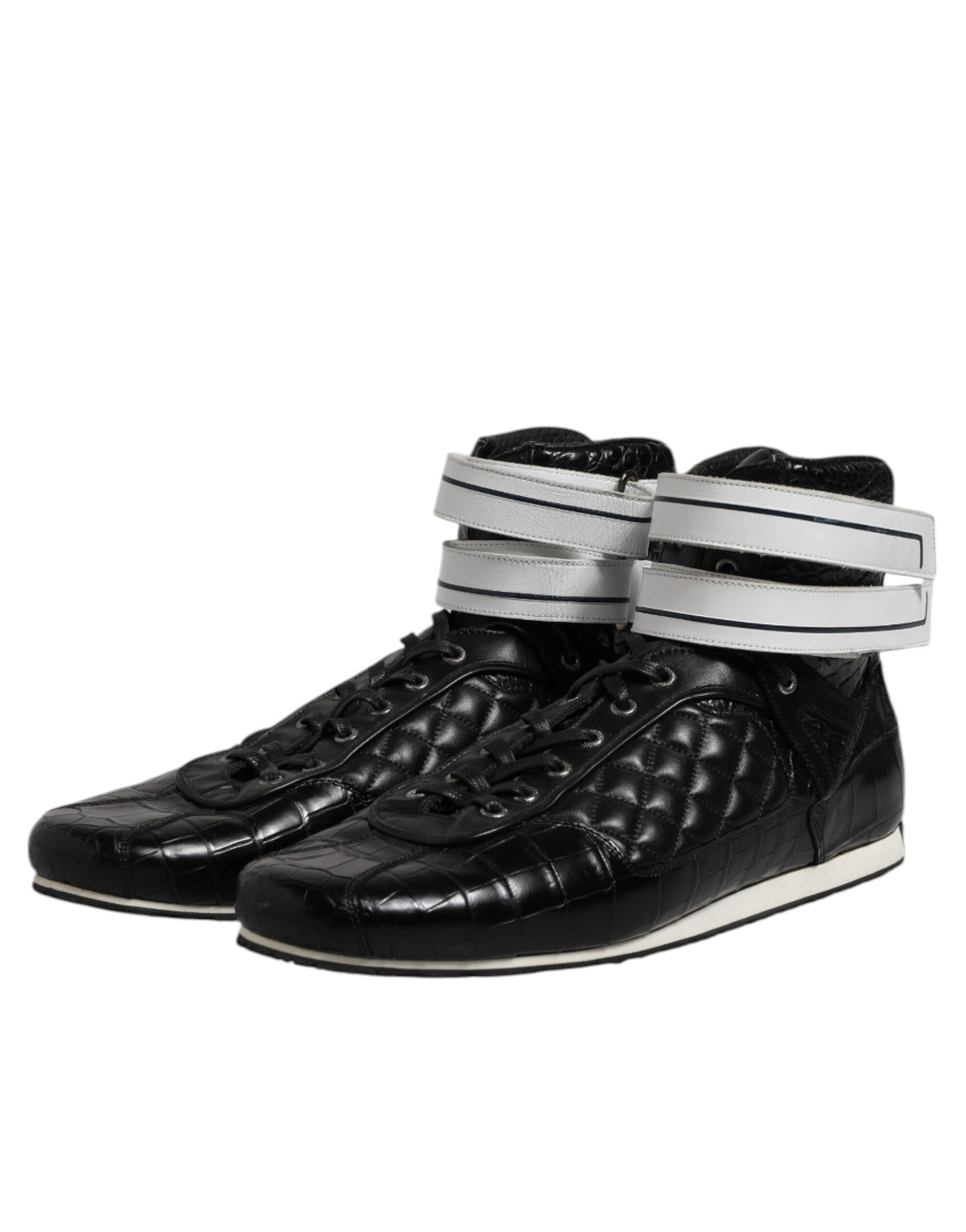 Experience the exquisite Dolce & Gabbana Black Quilted Leather Lace Up Sneakers, where luxurious craftsmanship meets timeless elegance, perfect for the discerning individual.
