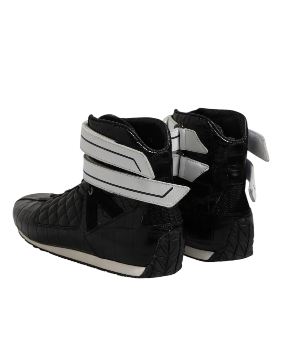 Elevate your style with Dolce & Gabbana's Black Quilted Leather Lace Up Sneakers, where exquisite craftsmanship meets luxurious comfort for the discerning individual.