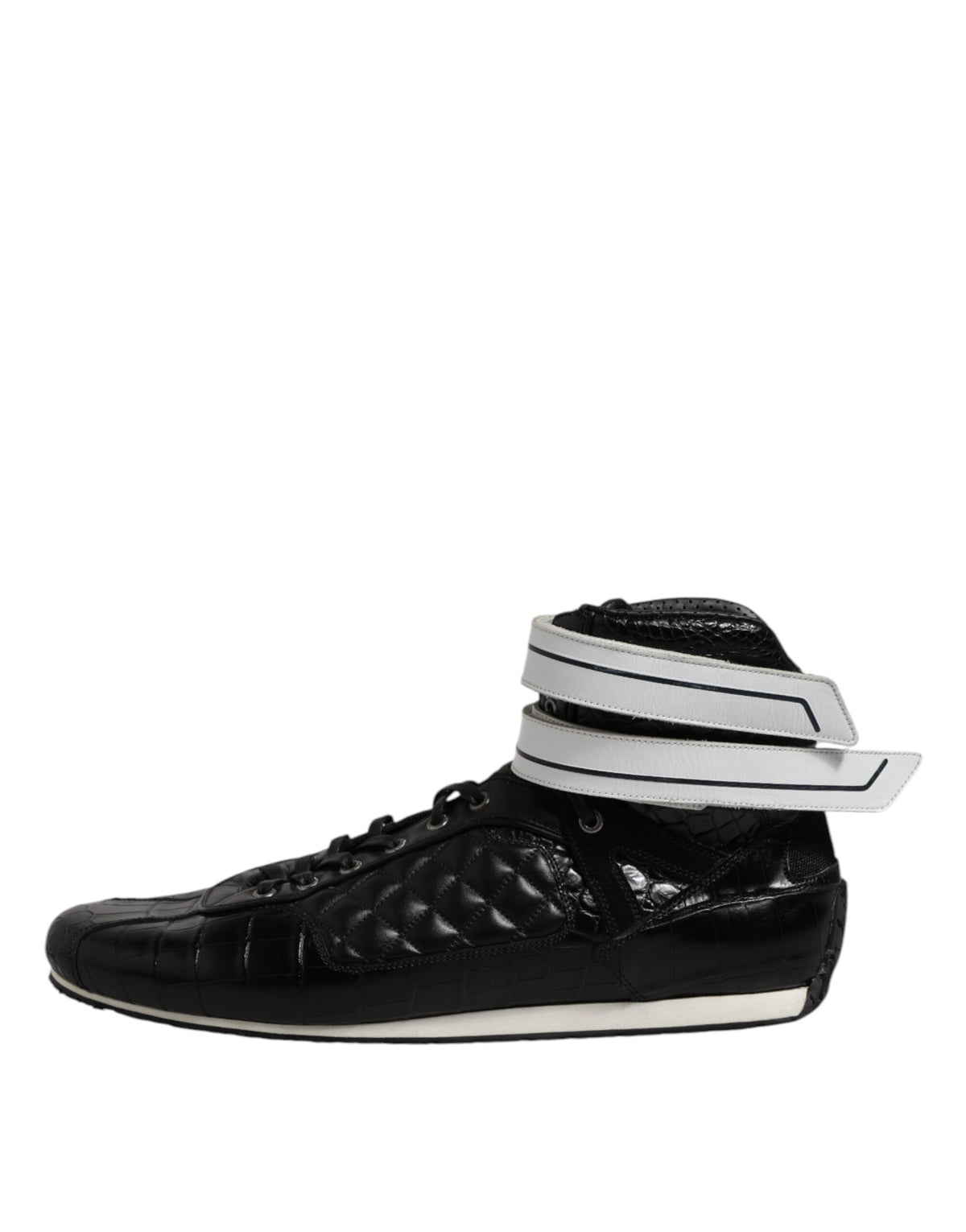 Experience the exquisite Dolce & Gabbana Black Quilted Leather Lace Up Sneakers, where luxurious craftsmanship meets timeless elegance, perfect for the discerning individual.