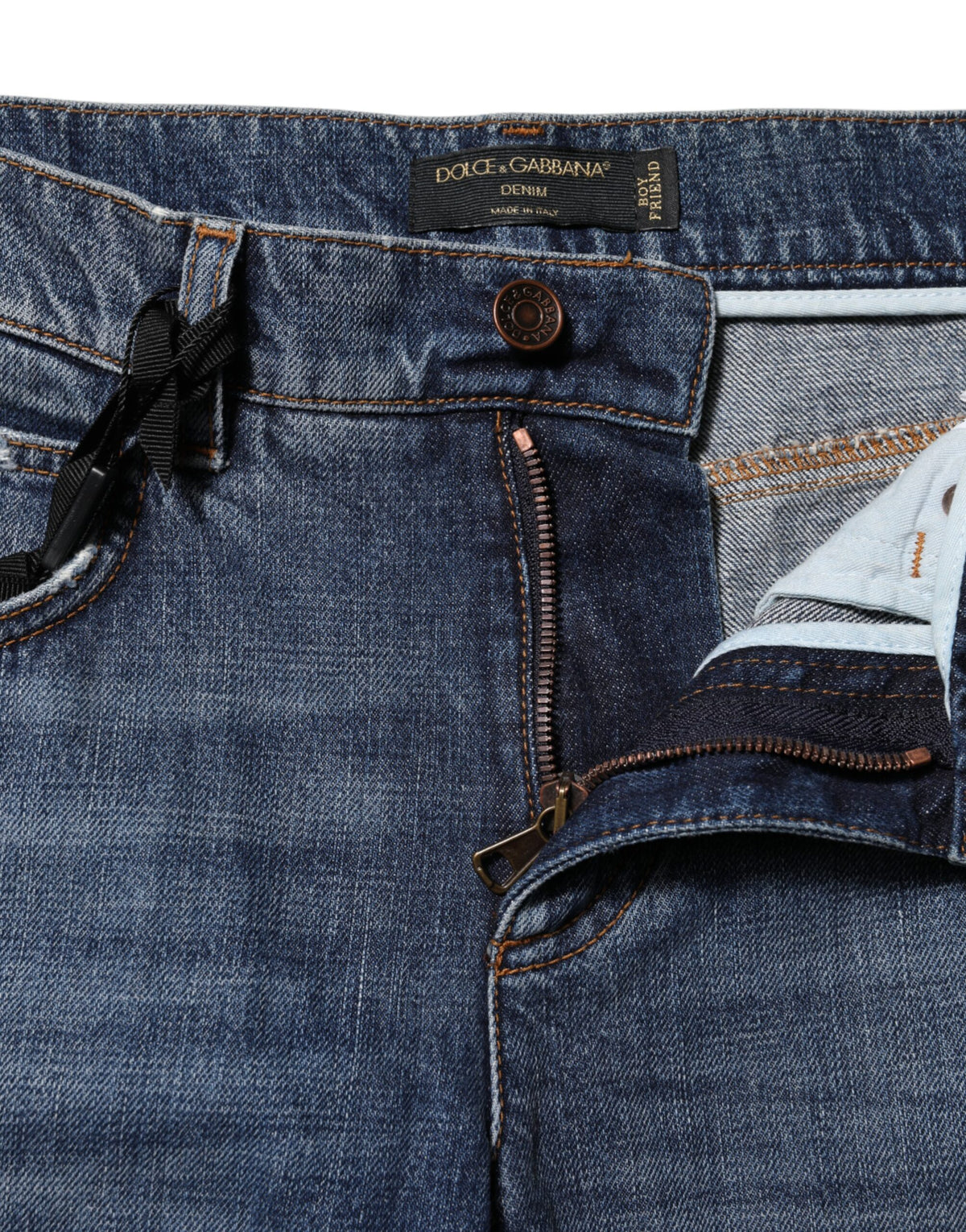 Indulge in the exquisite Dolce & Gabbana Blue Cotton Tattered Boyfriend Denim Jeans, where luxurious craftsmanship meets bold elegance for the discerning individual.