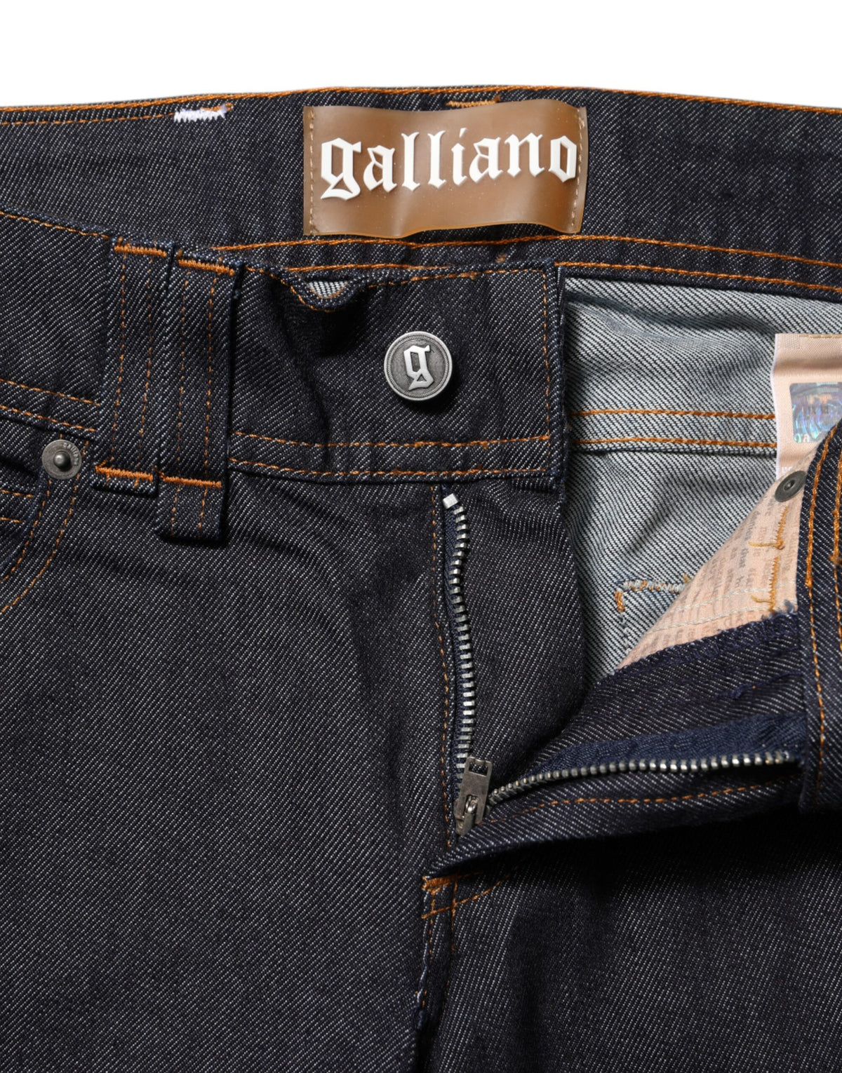 Elevate your wardrobe with John Galliano's Blue Mid Waist Cotton Wide Leg Denim Jeans, where exquisite craftsmanship meets timeless elegance for the discerning individual.