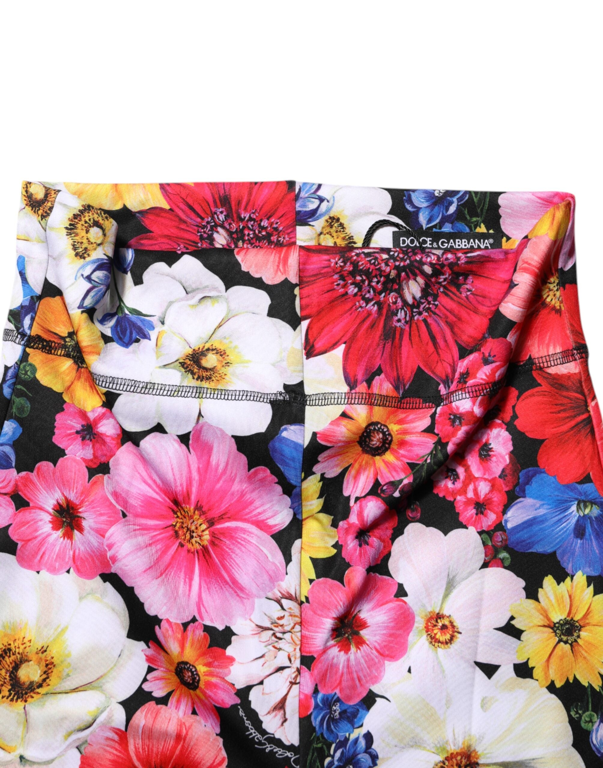Experience the exquisite artistry of Dolce & Gabbana's Multicolor Floral High Waist Leggings, where luxurious materials and vibrant design elevate your style to new heights.