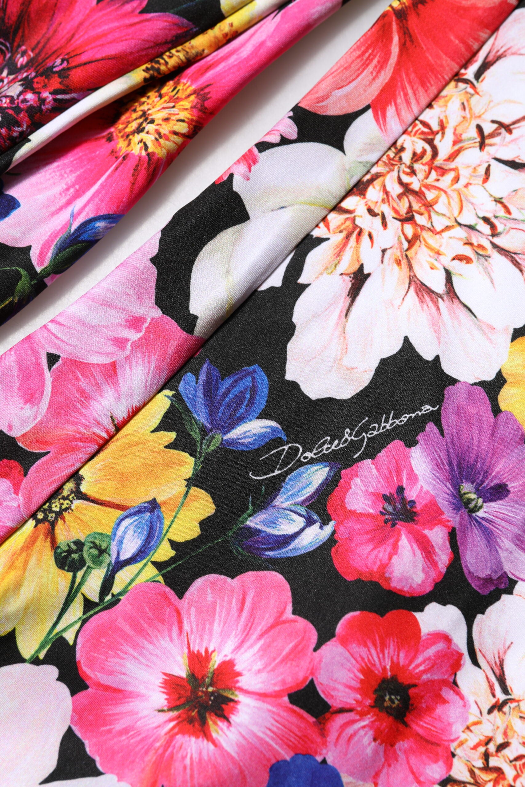 Elevate your style with Dolce & Gabbana's Multicolor Floral High Waist Leggings, where exquisite craftsmanship meets vibrant artistry, perfect for the discerning fashion connoisseur.