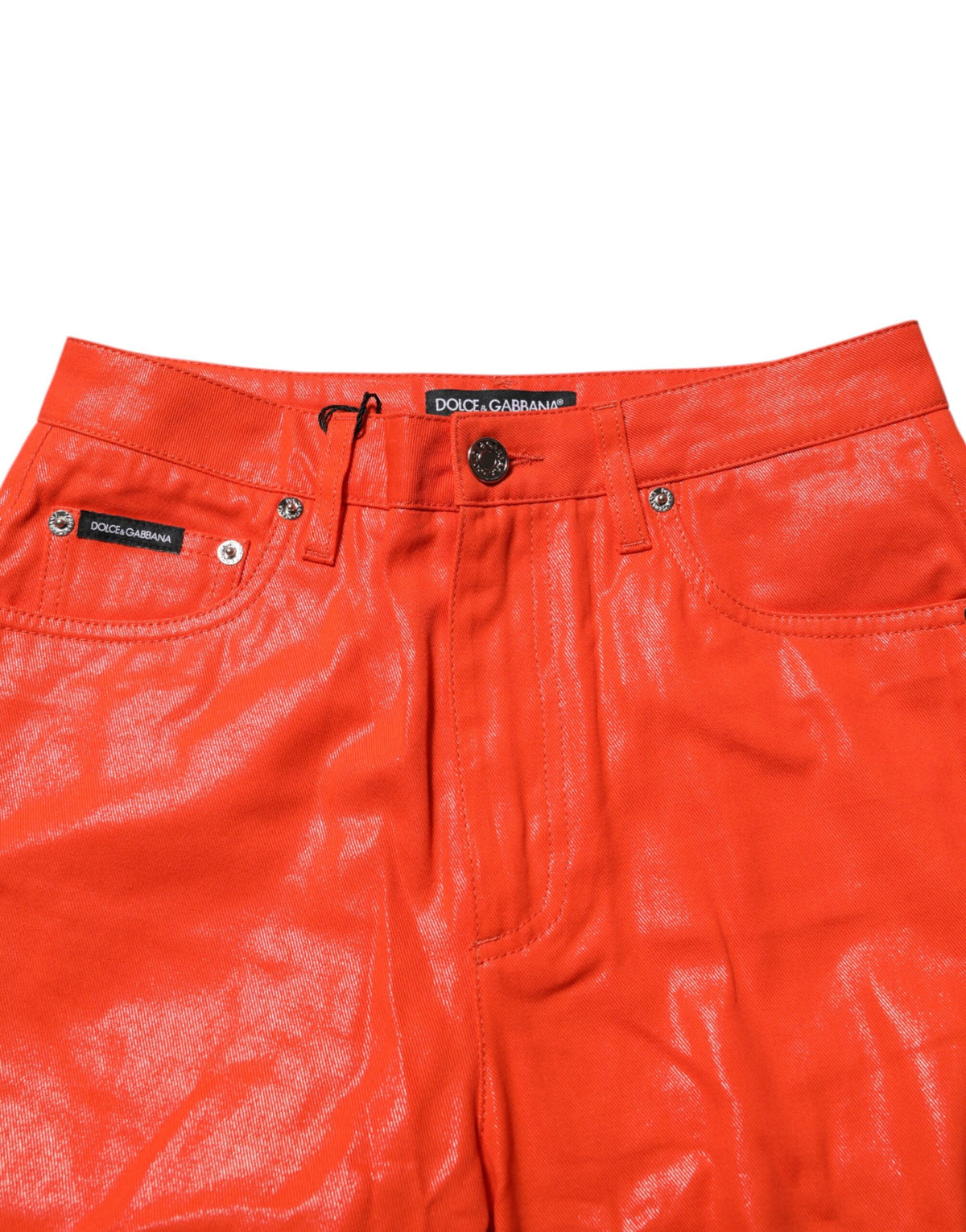 Indulge in the exquisite allure of Dolce & Gabbana's Orange Cotton High Waisted Denim Jeans, where luxurious craftsmanship meets vibrant sophistication for the discerning individual.